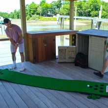 An image showing a man playing the PutterBall golf putting game on a dock.